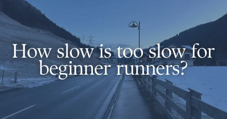 a picture of a running road with a text overlay "how slow is too slow for beginner runners?"