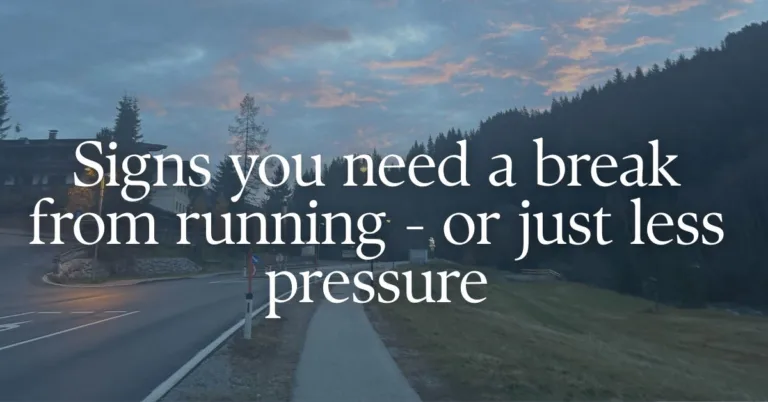 a picture of a running path with a text overlay "signs you need a break from running"